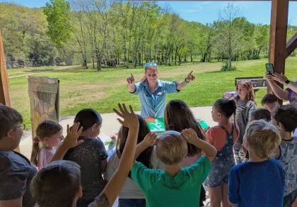 Group of children learning outside