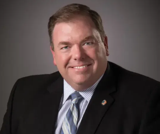 Headshot of a Man in a Suit